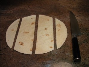 Cut tortillas into 3" wide strips.