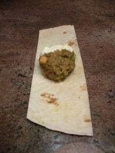 Spoon lentils & potatoes onto center of tortilla strip.
