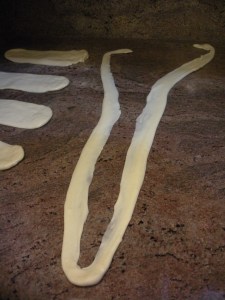 Tear each belt lengthwise down the center forming one long noodle